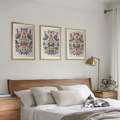 Set of 3 framed wall art pieces featuring colorful floral patterns