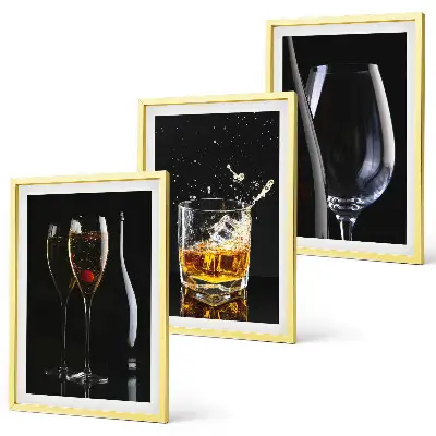 Set of 3 framed wall art pieces featuring glasses of wine and whiskey on a black background