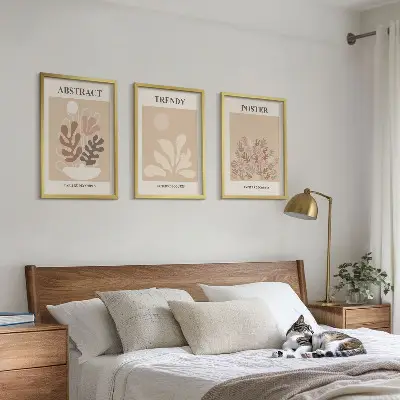 Set of 3 framed wall art pieces with beige and brown plant motifs