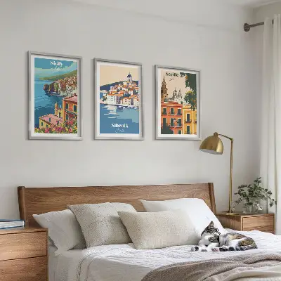 Set of 3 framed wall art pieces featuring city landscapes with buildings