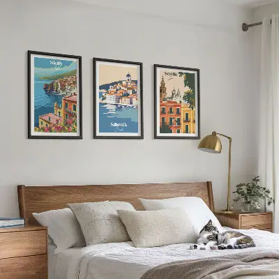 Set of 3 framed wall art pieces featuring city landscapes with buildings