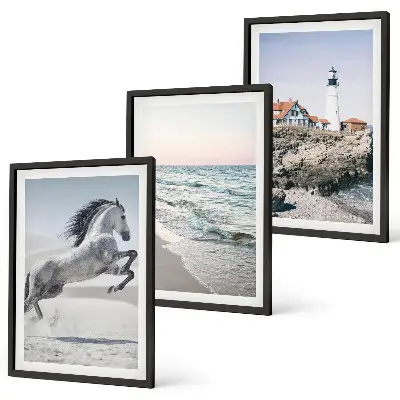 Wall art set featuring horses on a beach with a lighthouse and waves