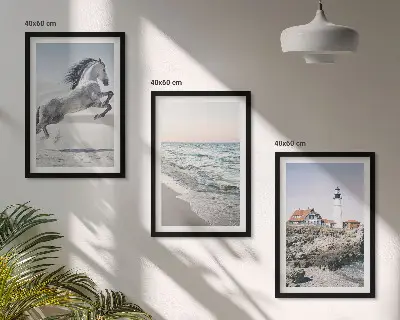 Wall art set featuring horses on a beach with a lighthouse and waves