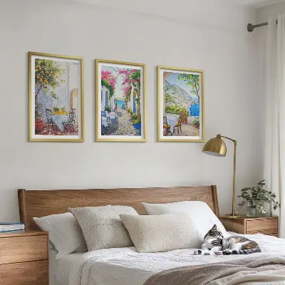 Three-piece wall art set charming streets with plants and sea view