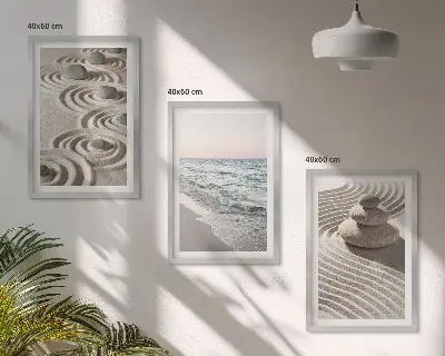 Set of 3 framed wall art pieces featuring waves, sand, water, and beach stones