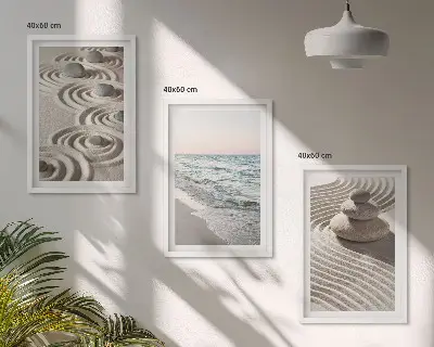 Set of 3 framed wall art pieces featuring waves, sand, water, and beach stones