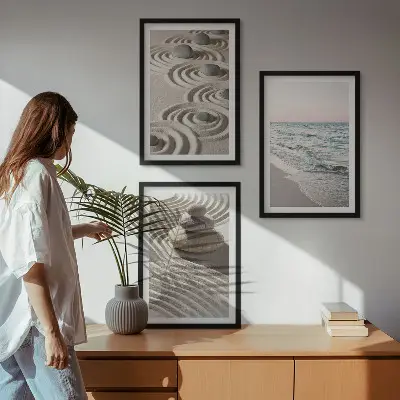 Set of 3 framed wall art pieces featuring waves, sand, water, and beach stones