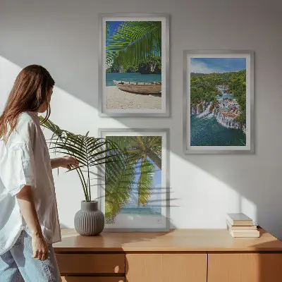 Three-piece wall art set featuring a beach, boat, waterfalls, and palm trees