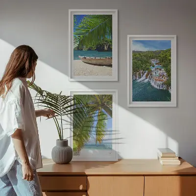 Three-piece wall art set featuring a beach, boat, waterfalls, and palm trees
