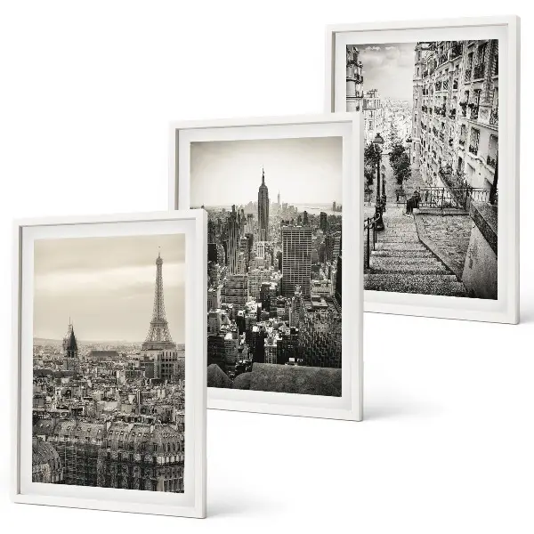 Set of 3 framed wall art pieces featuring views of Paris and New York stairs