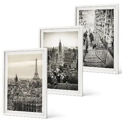 Set of 3 framed wall art pieces featuring views of Paris and New York stairs