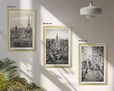 Set of 3 framed wall art pieces featuring views of Paris and New York stairs