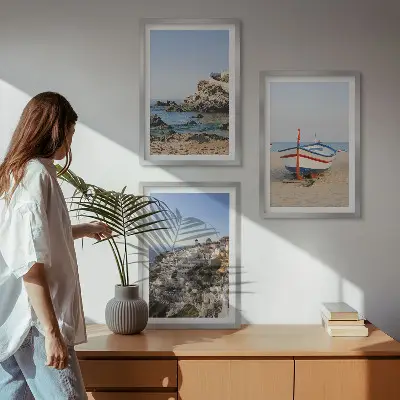 Set of 3 framed wall art pieces featuring views of Greece with a boat and houses