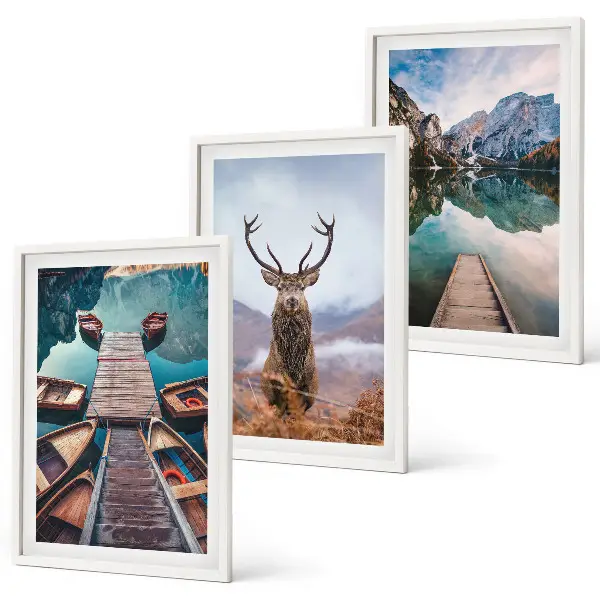 Wall art set featuring lake boats, a deer, and mountains