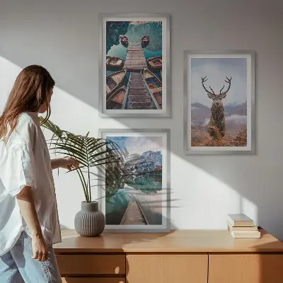 Wall art set featuring lake boats, a deer, and mountains