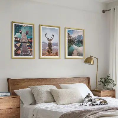 Wall art set featuring lake boats, a deer, and mountains
