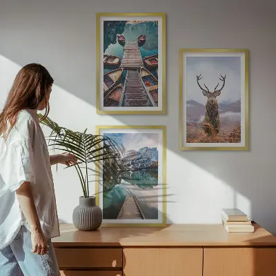 Wall art set featuring lake boats, a deer, and mountains
