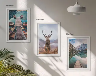 Wall art set featuring lake boats, a deer, and mountains