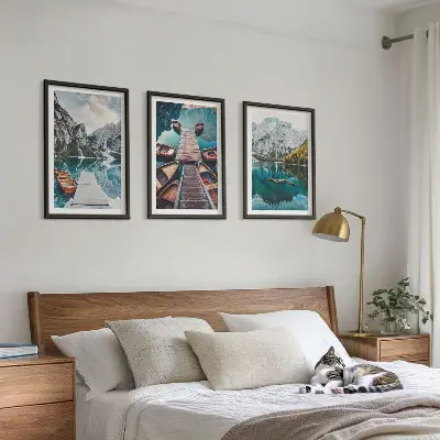Three-piece wall art featuring a lake, bridges, and mountains