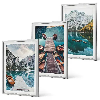 Three-piece wall art featuring a lake, bridges, and mountains