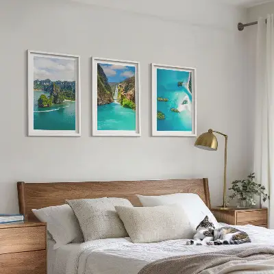 Set of 3 framed wall art pieces featuring tropical islands and turquoise water