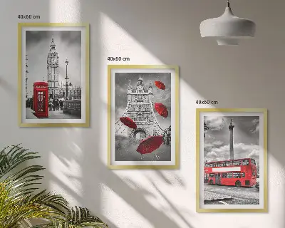 Set of 3 framed wall art pieces featuring a red umbrella booth and a London bus
