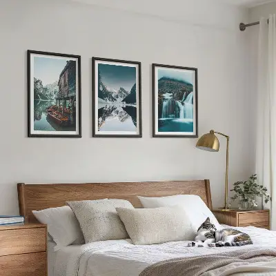 Set of 3 framed wall art pieces featuring mountain landscapes with waterfalls and lakes