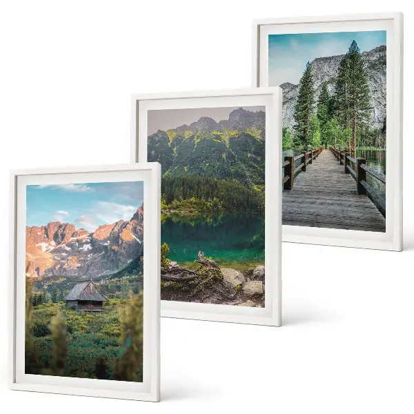 Three-piece mountain landscape wall art featuring a lake and bridge