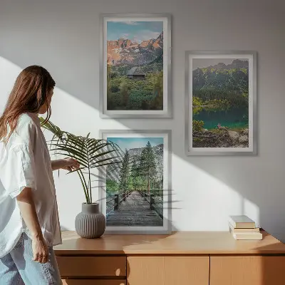Three-piece mountain landscape wall art featuring a lake and bridge