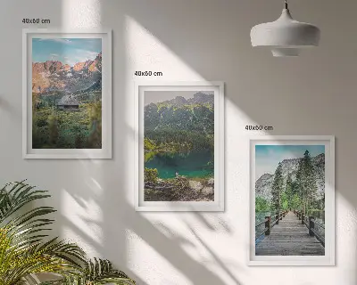 Three-piece mountain landscape wall art featuring a lake and bridge