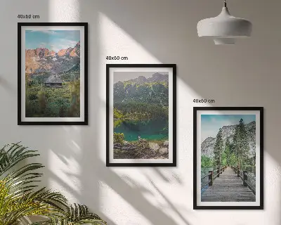 Three-piece mountain landscape wall art featuring a lake and bridge