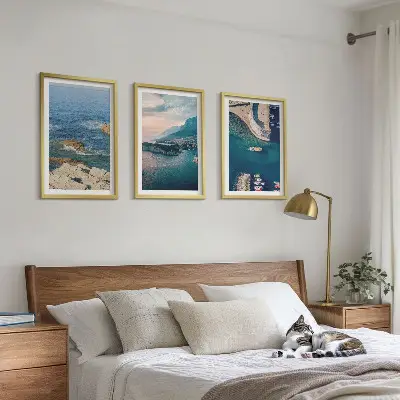 Set of 3 framed wall art pieces featuring sea views, cliffs, and ports