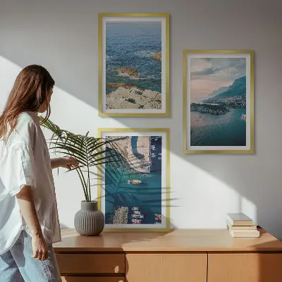 Set of 3 framed wall art pieces featuring sea views, cliffs, and ports