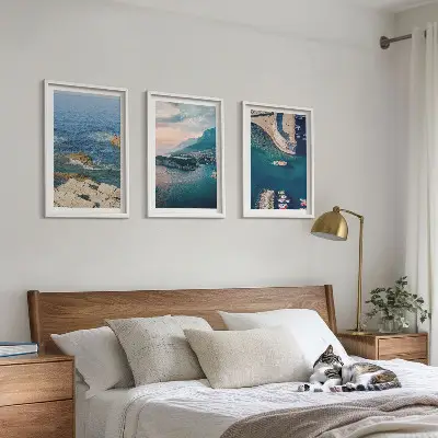 Set of 3 framed wall art pieces featuring sea views, cliffs, and ports
