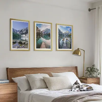 Three-piece wall art set featuring mountains, lakes, and wooden piers