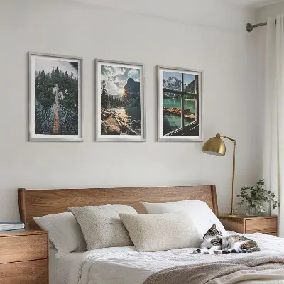 Set of 3 framed wall art pieces featuring a landscape with a bridge, forest, lake, boats, and mountains