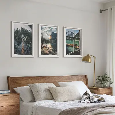 Set of 3 framed wall art pieces featuring a landscape with a bridge, forest, lake, boats, and mountains