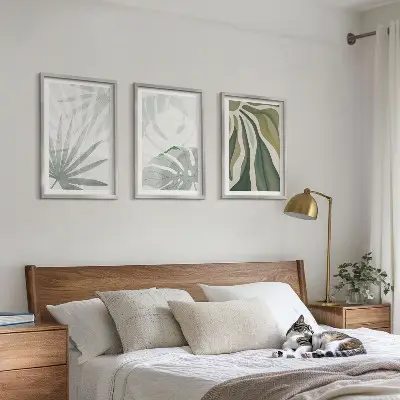 Wall art set featuring green and gray plant leaves