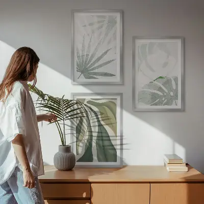 Wall art set featuring green and gray plant leaves