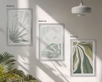 Wall art set featuring green and gray plant leaves