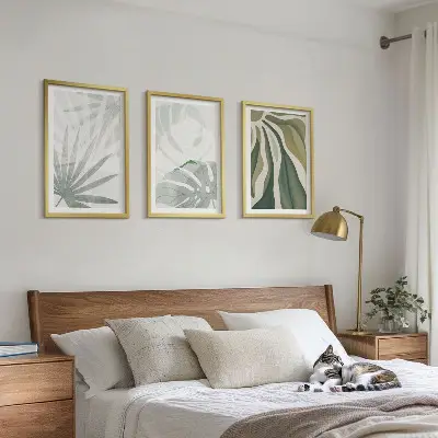 Wall art set featuring green and gray plant leaves