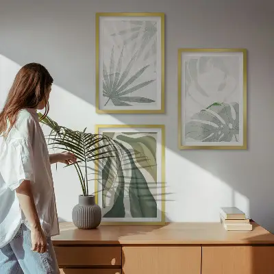Wall art set featuring green and gray plant leaves