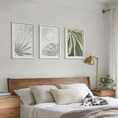 Wall art set featuring green and gray plant leaves