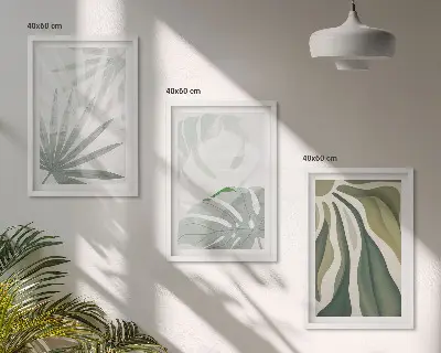 Wall art set featuring green and gray plant leaves