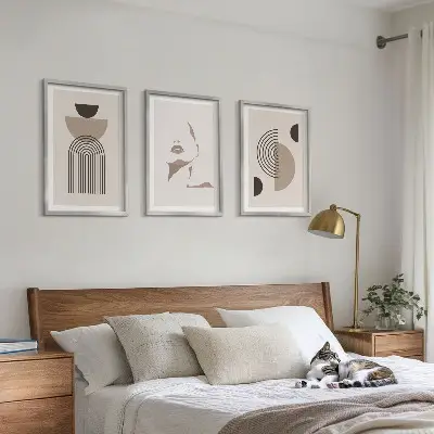 Set of 3 framed wall art pieces abstract forms and face design