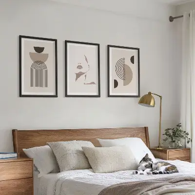 Set of 3 framed wall art pieces abstract forms and face design