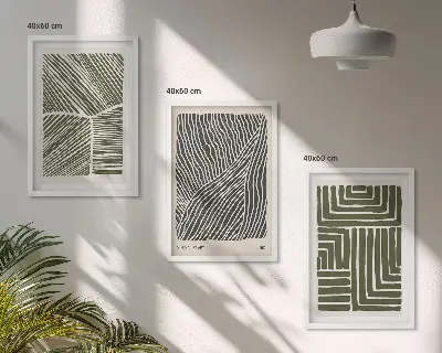 Set of 3 framed wall art pieces with green patterned lines and shapes
