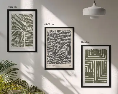 Set of 3 framed wall art pieces with green patterned lines and shapes