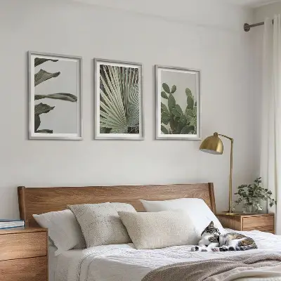Three-piece wall art set pastel tropical leaves design