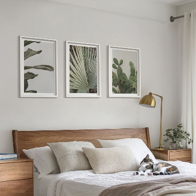 Three-piece wall art piece Leaves of tropical plants pastel